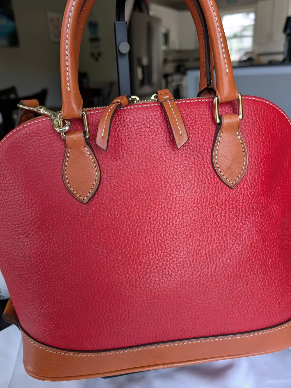 Dooney & Bourke Red Pebbled Leather Satchel with Tan Trim.Used In Great Conditio